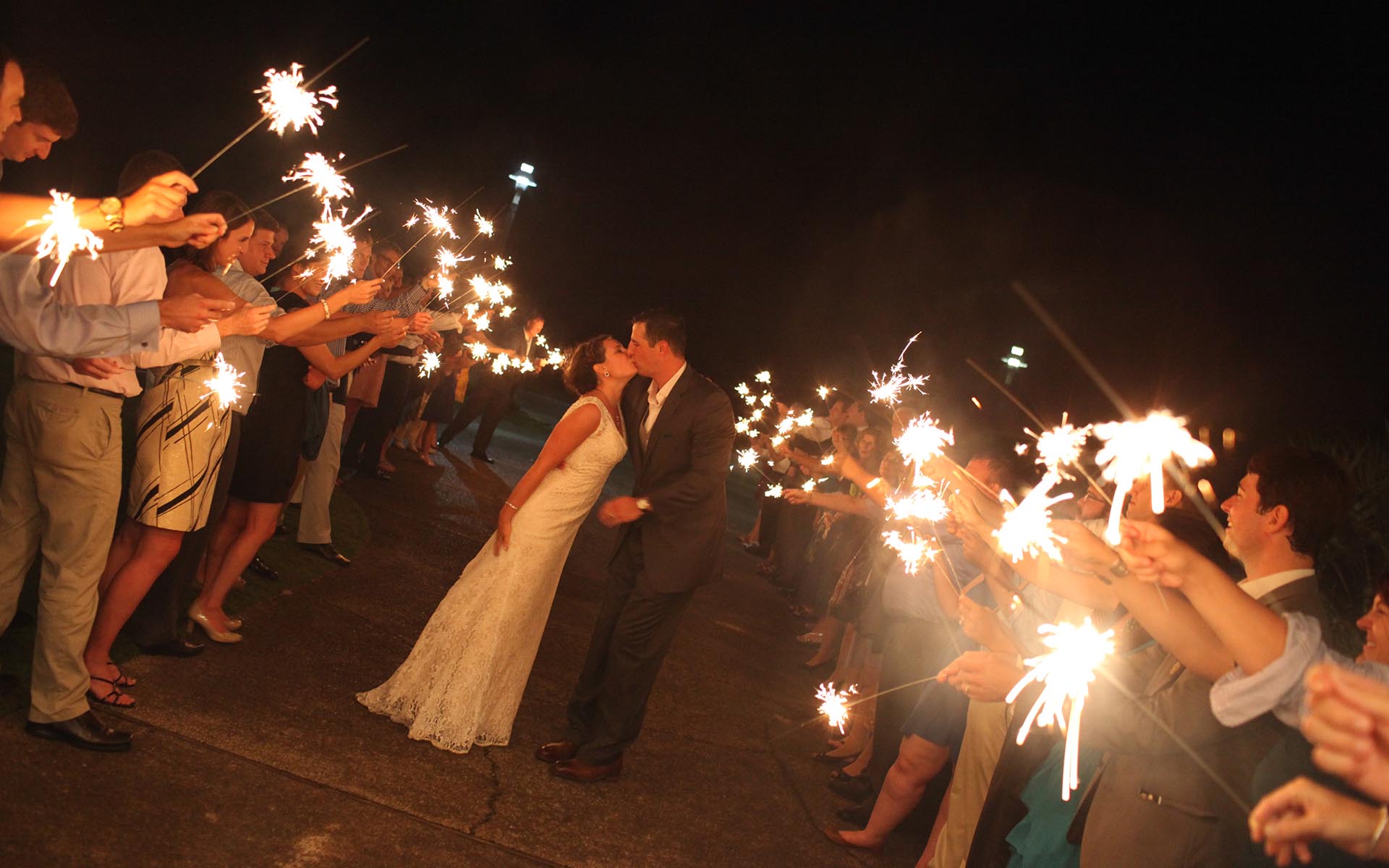 The Currituck Club - Wedding couple with sparklers